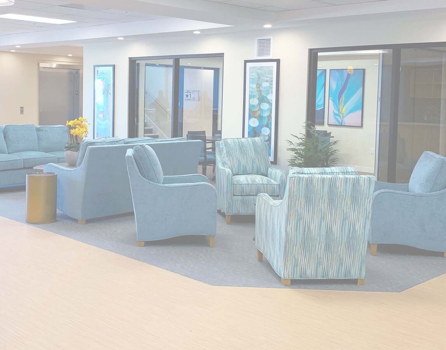 Indoor view of lobby with blue comfortable seating